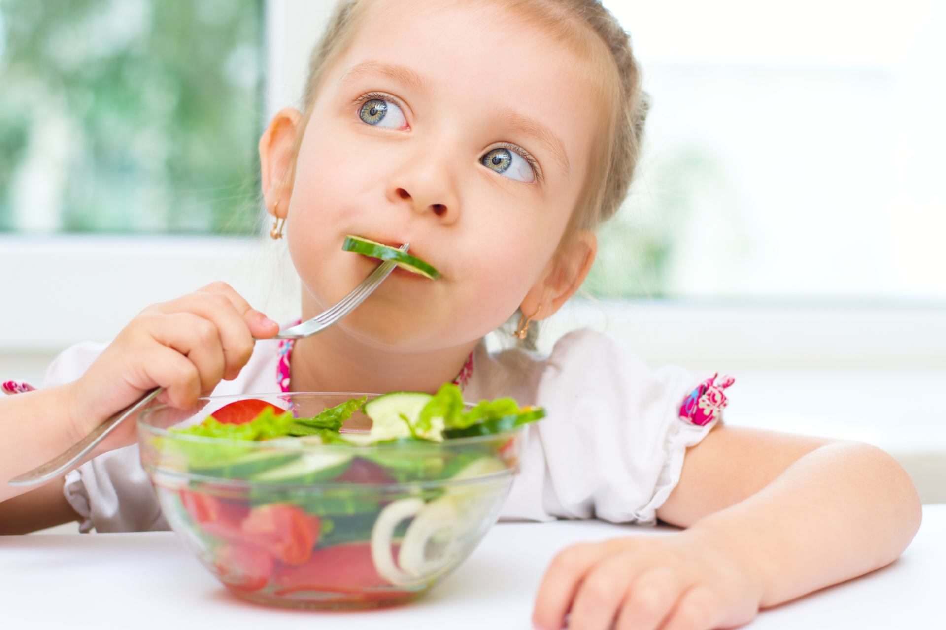 girl eating a salad