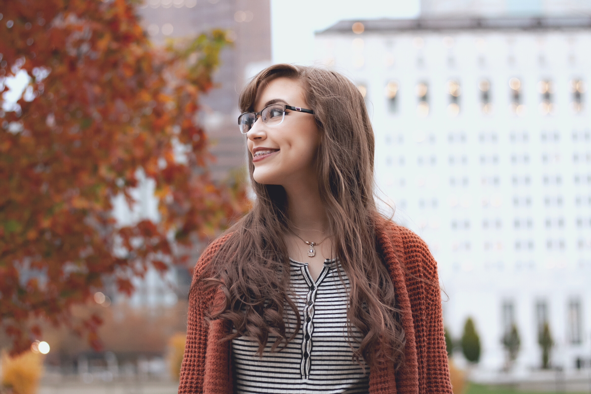 fall braces girl texting at school